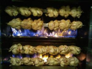 Rotisserie chickens in the oven